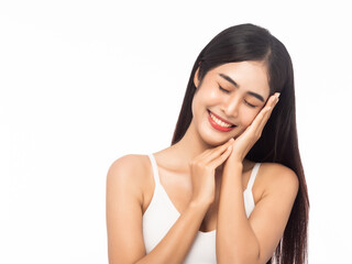 Naklejka premium Beautiful Young Asian woman clean fresh skin with hands touching face isolated on white background. Facial treatment, Cosmetology, Beauty and skin care concept.