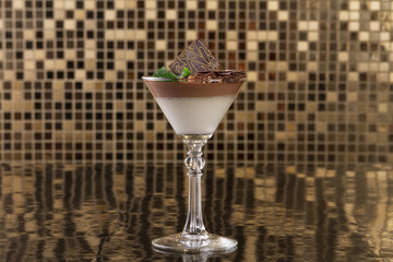 Chocolate mousse with mint in portion glasses