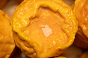 Soft cheese Langres, French cow milk. Creamy and crumbly orange colored, French cheeses collection
