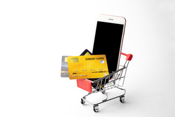 tablet pc with a credit card and a shopping cart