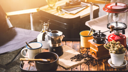 Cup Of Coffee, beans roating and Ingredients for making coffee  and accessories on the table wooden background. Coffee making concept