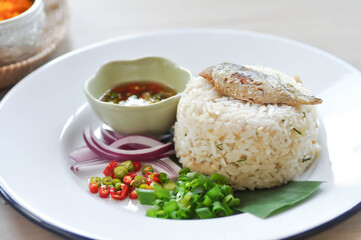 fried rice or stir-fried rice with fish, rice topped with fish