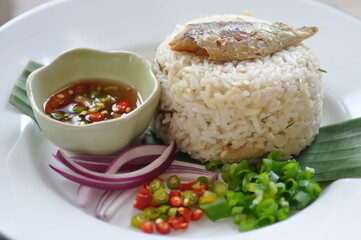 fried rice or stir-fried rice with fish, rice topped with fish
