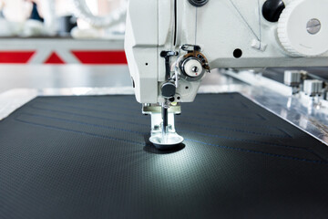 Fabric industry production line. Textile factory. Working tailoring process