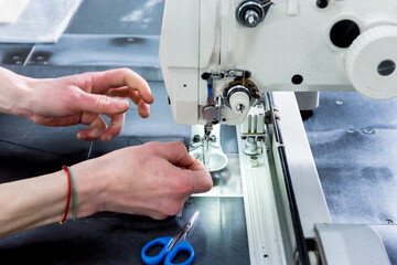 Fabric industry production line. Textile factory. Working tailoring process