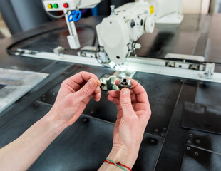 Fabric industry production line. Textile factory. Working tailoring process