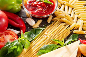 raw pasta, fresh tomato,  Basil, red chili pepper, garlic,  vegetable sauce, ketchup, sweet pepper, onion,    cheese