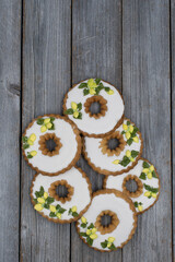Lemon wreath cookies decorated with royal icing on wooden backgrond