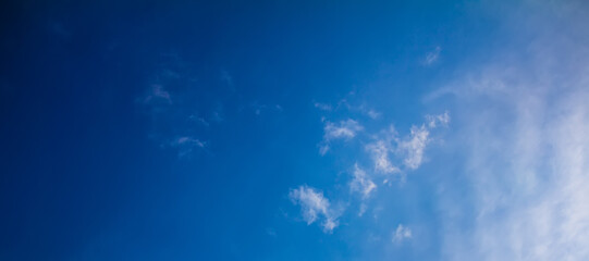 Fototapeta na wymiar Blue Sky with Soft Clouds
