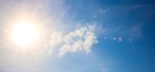 Naklejka na ściany i meble Blue Sky with Soft Clouds and Sun