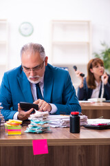 Two employees and excessive work in the office