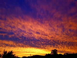 Colorful sunset. Amazing landscape with colorful vivid sunset on the bright sky.