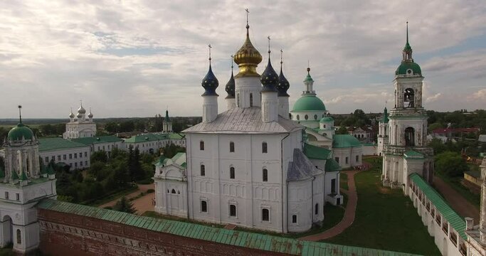 4K high quality summer day video of Rostov Spaso-Yakovlevski Monastery churches and cathedrals located on shore of Nero Lake in Yaroslavl Region, north-eastern Russia 200 km from Moscow