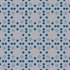 Pattern from dots on light seamless background.