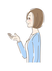 笑顔で手を差し出す女性の横顔