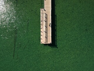 Aerial view of Pier at Lake Tahoe, forest and mountains