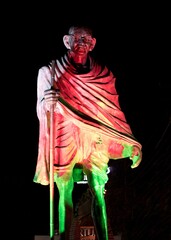 statue of mahatma Gandhi holding his stick  