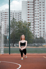 Fototapeta premium a sporty blonde of European appearance is engaged in fitness
