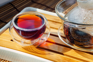 PU-erh tea in a bowl on a tea Board, tea ceremony