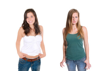 Portraits of two beautiful young women wearing  blue jeans and top, isolated on white studio...