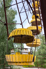 Fototapeta na wymiar Abandoned ferris wheel attraction