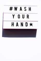 Wash your hand  graphic image, white lightbox with text, self protecting conceptual image, flatlay composition, on a white background
