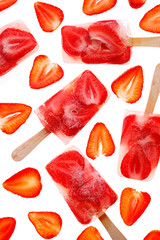  Homemade strawberry ice lollies on a white background, top view