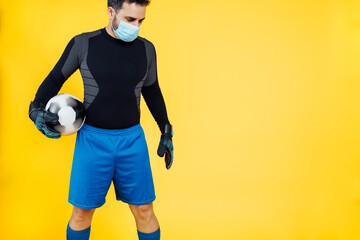 football soccer goalkeeper with a mask on his face