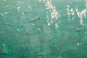 Old painted wall with cracked paint