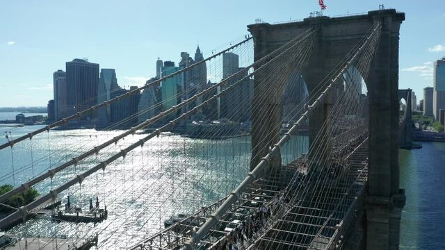 flying alongside Brooklyn Bridge as BLM march crosses towards Manhattan