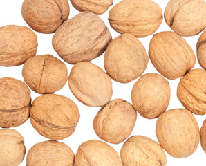 group of whole walnuts isolated on white background