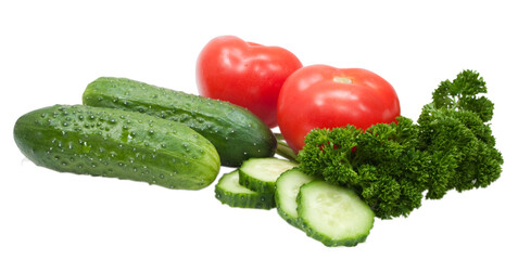 fresh cucumbers tomatoes and parsley isolated on white background