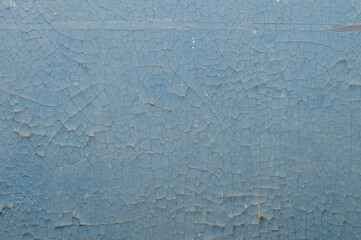 Old painted wall with cracked paint