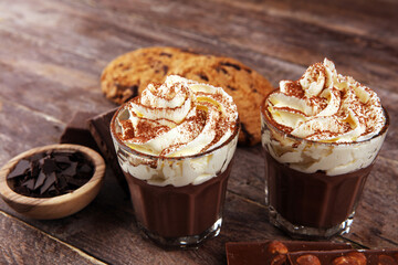 hot chocolate with cocoa and chocolate chip cookies and whipped cream