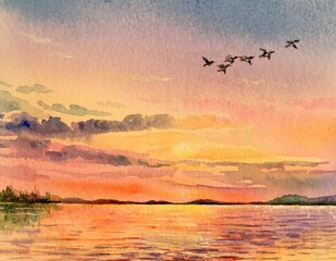 Watercolor sunset with a water view. Group of flying ducks. Orange, red, purple background. Design element. Copy space.