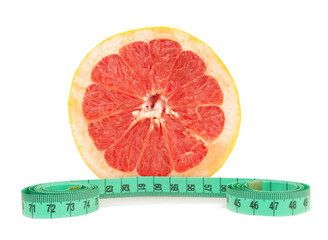 half grapefruit and tape measure isolated on white background