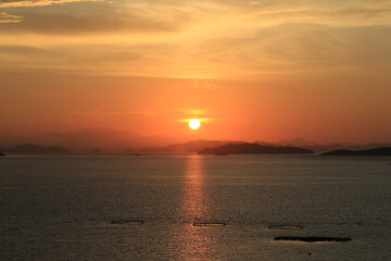 dawn over the mountains in the sea