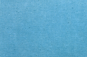 Fototapeta premium Blue fabric texture in close-up, cloth background