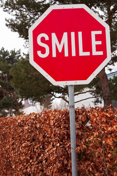 Smile road sign