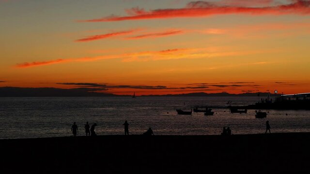 Sunset over the las canteras beach in gran canaria