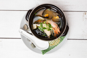 Miso soup with mussels in a bowl