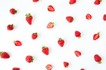 Slice strawberry pattern on white background. Flat lay. Top view. Summer berries