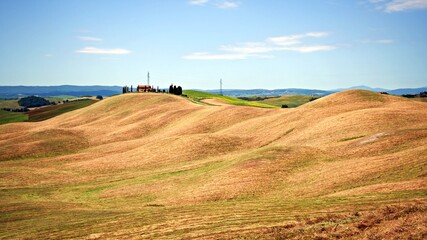 natural landscape of the Crete Senesi near Asciano in the Tuscan countryside in Siena, Italy. The Crete Senesi are typical terrain features characterized by gullies, cliffs and biancane.