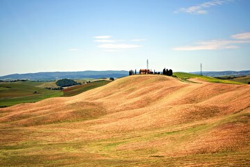 Fototapeta na wymiar natural landscape of the Crete Senesi near Asciano in the Tuscan countryside in Siena, Italy. The Crete Senesi are typical terrain features characterized by gullies, cliffs and biancane.