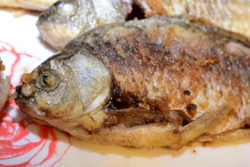 close up of river fish caras fried