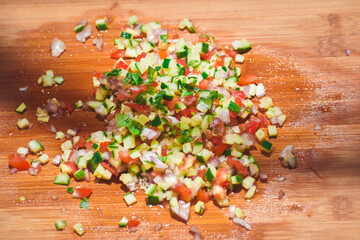 Chopped vegetables on wooden board