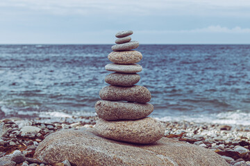 Tower of pebbles on the beach