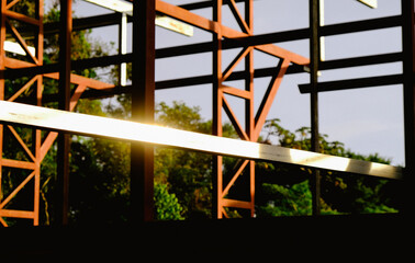 Obraz premium construction in the jungle at sunset