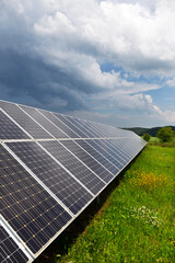 Solar Power Station on the spring flowering Meadow 