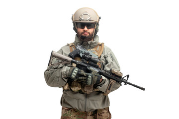 American ranger in military equipment and with a rifle stands on a white background, portrait of a...